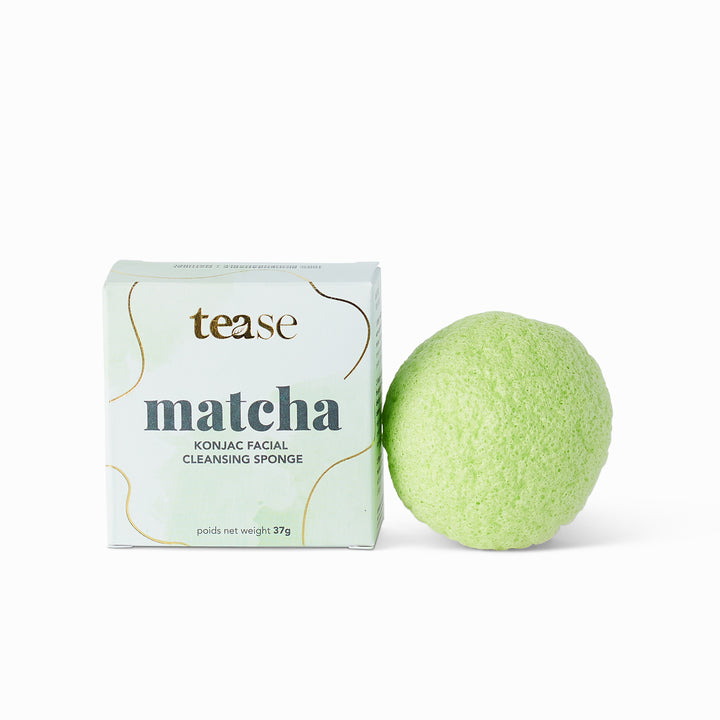 Tease Wellness Matcha Konjac Facial Cleansing Sponge with white and green packaging and round green sponge.